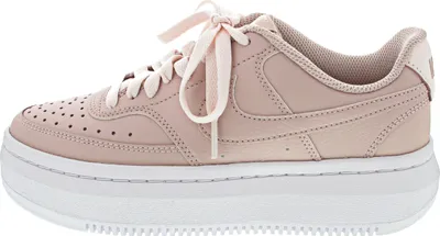 A side view of a pink Nike Court Vision Alta Ltr shoe with a white platform sole.