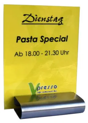 A yellow sign advertising a "Pasta Special" at "Vpresso cafe - restaurant - bar" is held by a silver metal clip.