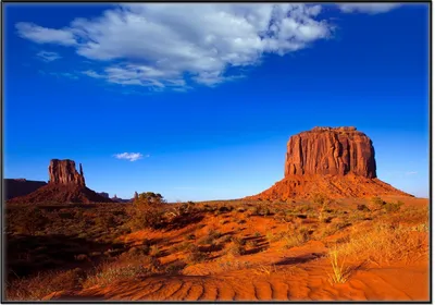 Produktbild von Wallario Wandbild Monument Valley am Abend I, Größe: 70,30 x 100,30 cm, Poster mit schwarzem Aluminiumrahmen