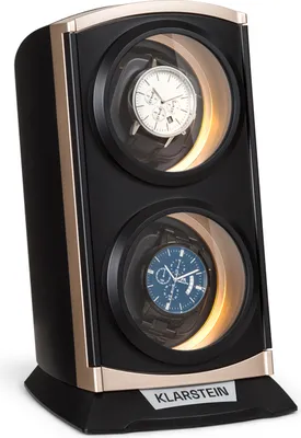 A product shot of a double watch winder with two watches inside.