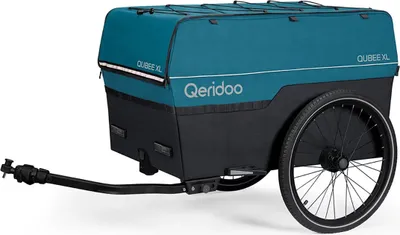 A teal and black cargo trailer is shown against a white background.