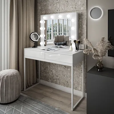 A modern vanity table with a lighted mirror, makeup brushes, and decorative items, set in a stylish room with curtains and a pouf.