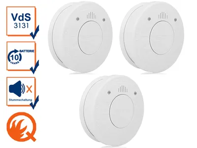 Three white smoke detectors are arranged in a triangular formation against a white background. To the left of the detectors are several informational icons and text.