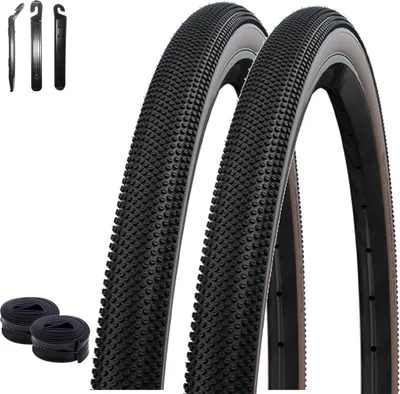 Immagine prodotto di 2 pneumatici pieghevoli Schwalbe TLE E-25 G-One Performance Race Guard bronzo 45-622 ( 28 x 1,70 ) + 2 camere d'aria Schwalbe SVL17 incl. leva per pneumatici