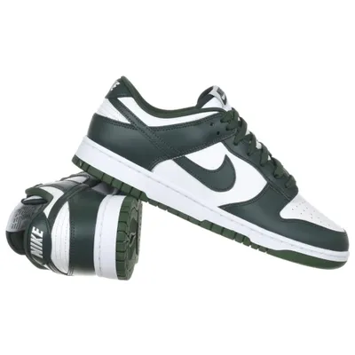 A pair of Nike Dunk Low sneakers in white and green.