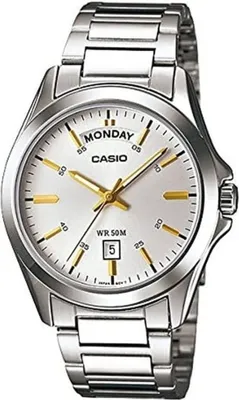 A close-up studio shot of a silver Casio watch with a white face and gold accents.
