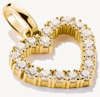 A close-up shot of a gold heart-shaped charm pendant with clear stones, set against a white background.