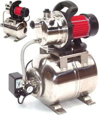 A stainless steel water pump with a red motor and black handle, shown against a white background. A smaller, similar pump is visible in the background.