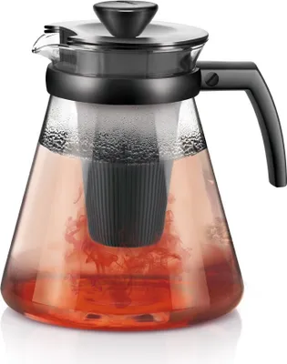 A glass teapot with a black lid and handle, filled with red liquid and a black tea infuser.