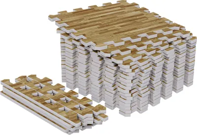 A stack of interlocking foam floor mats with a wood grain pattern.