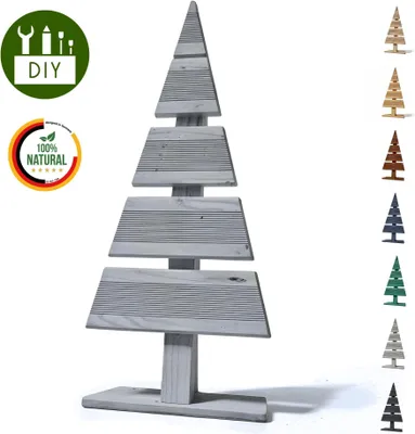 A collection of wooden Christmas trees in various colors, with a larger grey one in the foreground and several smaller ones lined up on the right.