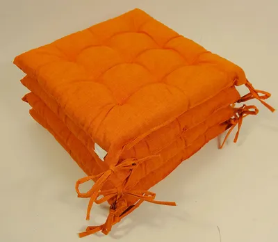 Produktbild von Set 4 x Stuhlkissen / Sitzkissen Fabia mit Schleifen 40 x 40 cm Dicke 5 cm , Fb. orange , Baumwolle/Polyester 80/20 %