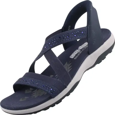 Auf dem Bild ist eine blaue Sandale zu sehen die von der Seite aufgenommen wurde. Die Sandale zeigt ein einfaches Design mit zwei breiten Riemen und einer flachen Sohle.