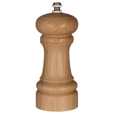 A wooden pepper mill on a white background.