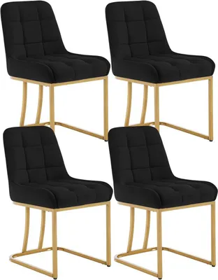 Four black dining chairs with gold metal frames are arranged in a two-by-two grid against a white background.