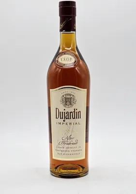 A bottle of Dujardin Imperial brandy against a white background.