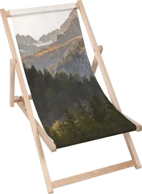A wooden deck chair with a printed image of a mountain landscape.