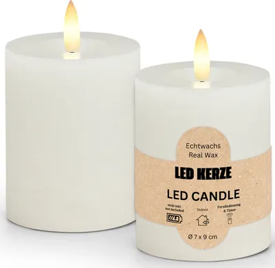 Two white LED candles with flickering flames, one with a product label.