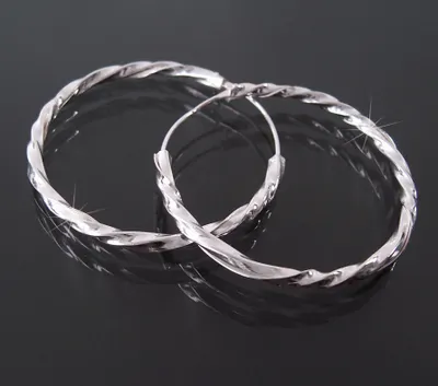 Produktbild von Ohrringe Silber 925 Creolen 30mm Niklarson gedreht 20320-30