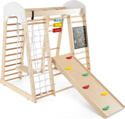 A wooden indoor playground structure for children.