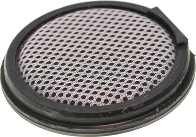 A close-up view of a round filter with a mesh surface and a black rubber rim.