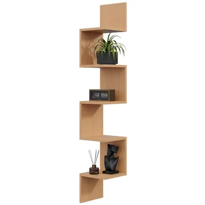 A zigzag corner shelf with decorative items on it.