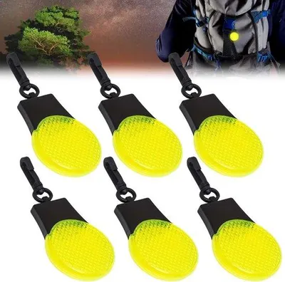 Produktbild von Kinderwagensicherheitsleuchte mit 6 LED Blinkern und Reflektorstreifen für Joggen und Schulwegsicherheit.