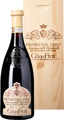 A bottle of red wine and its wooden presentation box.