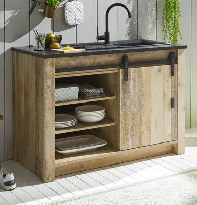 A rustic wooden kitchen cabinet with a sink and faucet, featuring sliding doors and open shelving.