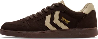 A side view of a brown Hummel sneaker with tan accents.