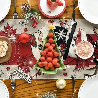Productafbeelding van Tafelkleed met sneeuwpop, rendier en kerstman - 40 x 140 cm