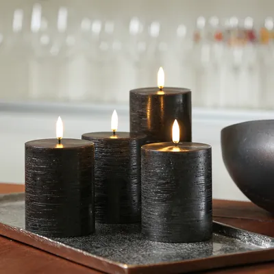 Produktbild von LED Kerzenset PIA - Rustik-Optik - H: 10cm - inkl. Batterien und Fernbedienung - schwarz - 4er Set