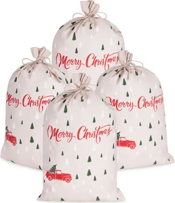 Four Christmas gift bags with a festive design.