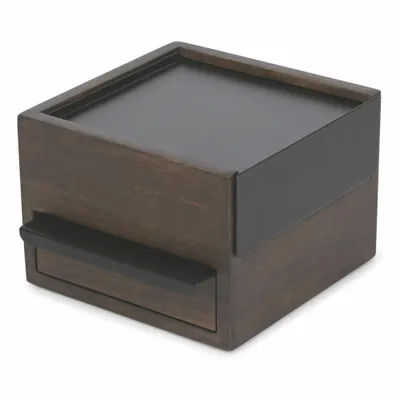 A wooden box with a drawer and a black accent.