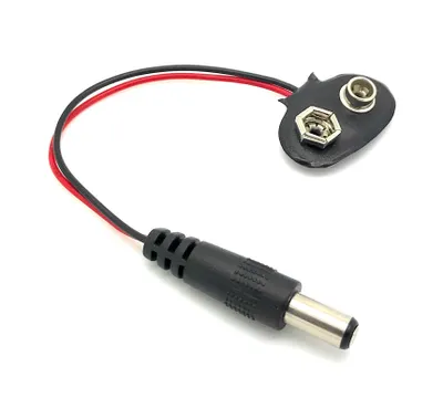 A 9V battery clip adapter with a DC barrel jack connector, shown on a white background.