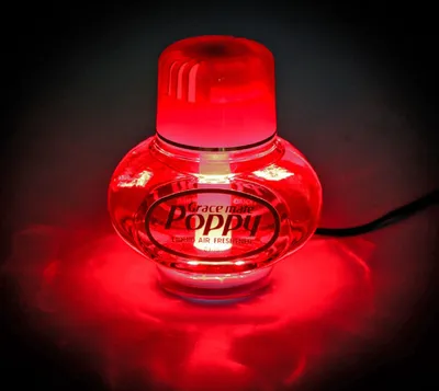 Produktbild von Original Poppy Lufterfrischer mit roter LED Beleuchtung 24 Volt, Duft Cattleya, Inhalt 150 ml, LKW Beleuchtung
