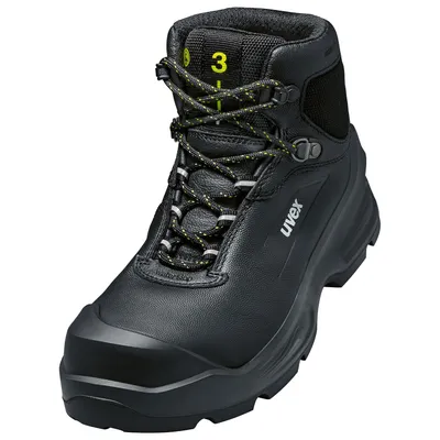 A black work boot with yellow accents.