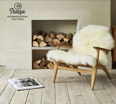 Produktbild von Unyqoos® Texel Schaffell weiß – echtes Schaffell Large 110x65 cm, natur, als Stuhl- oder Sofaauflage & Teppich, wärmend und atmungsaktiv