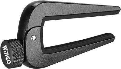 Imagen del producto de Capotraste universal para guitarra, de 9,2 x 4,2 x 1,8 cm, compatible con guitarras acústicas y eléctricas