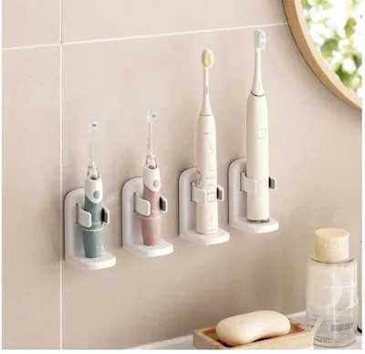 Produktbild von Unyqoos® Set mit 4 wandmontierten Haltern für elektrische Zahnbürsten – platzsparend, bohrfreie ABS-Halter, hygienische Aufbewahrung, universell kompatibel
