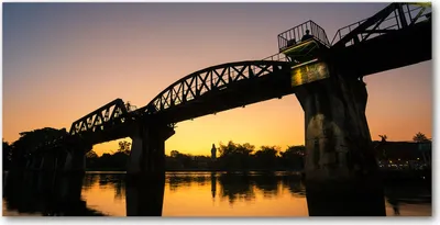 Produktbild von Tulup® Leinwandbild - 140x70 cm - Wandkunst - Drucke auf Leinwand - Leinwanddruck  - Sehenswürdigkeiten & Architektur - Orange - Brücke in Thailand