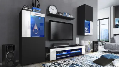 A modern living room setup featuring a TV and entertainment unit.