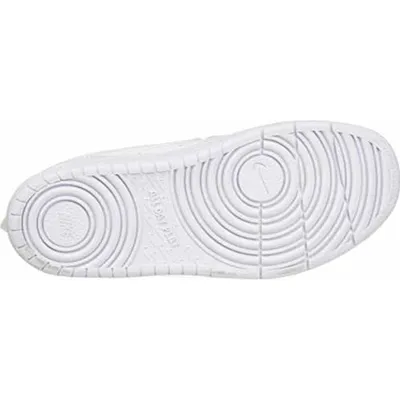 The underside of a white Nike shoe.