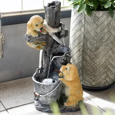 Produktbild von Hundewelpen Milo und Buddy Solarbrunnen für draussen LED-Licht Akku H49cm 101382