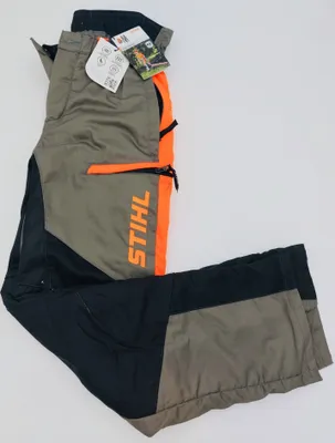 A pair of Stihl work pants laid out on a white background.