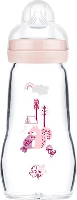 A clear studio shot of a baby bottle with a pink lid and a transparent glass body decorated with a woodland scene.