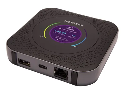 A black and gray Netgear Nighthawk mobile hotspot router is shown on a white background.