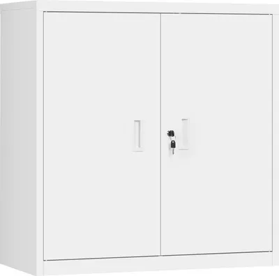 A white metal filing cabinet with two doors and two keys in the locks.