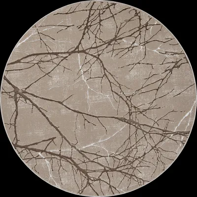 A round rug with a pattern of tree branches against a beige background.