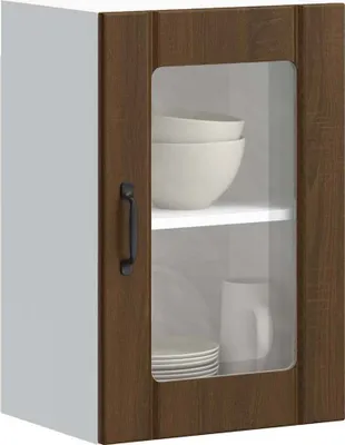A close-up of a wall cabinet with a glass door.
